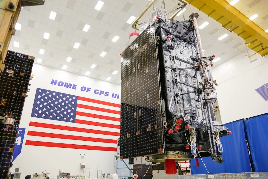 The GPS 3 Space Vehicle 07 stands in a clean room at Lockheed Martin’s facilities in Littleton, Colorado.